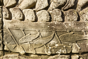 Bas reliefs depicting the naval battle between Khmer and the Chams at Bayon temple, Angkor, Siem...