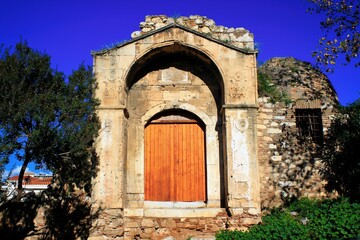 Fototapeta na wymiar Ruins of the Doorway or Gate of the Medrese, originally a Muslim theological school founded in 1721 in Athens, Greece.
