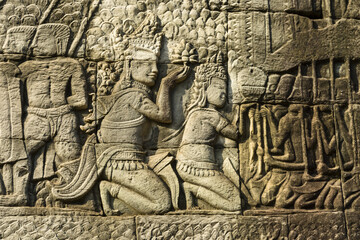 Detail of bas relief depicting worship of king on the Bayon , Angkor Thom, Siem Reap