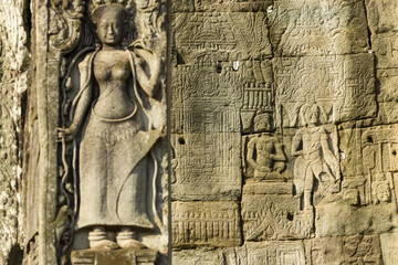 Apsara dancer statue on a wall of the Bayon , Angkor Thom, Siem Reap