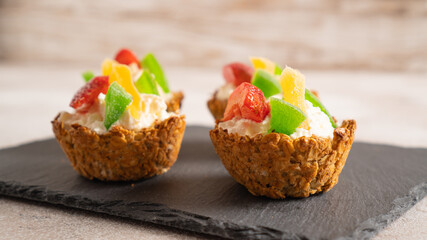 healthy and sweet breakfast. quick and easy recipe for homemade cupcake. summer dessert for children. oatmeal baskets