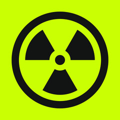 Fototapeta premium A black vector icon of radiation isolated on yellow background.