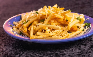 Tasty delicious garlic fries, cooked to a golden brown crisp. 