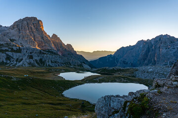 Naklejka na ściany i meble Sunrise in the Dolomites, beautiful colours and a chilled atmosphere early in the morning in South Tyrol, Italy