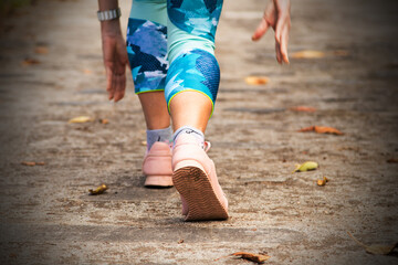 runner's feet at the start preparing the race