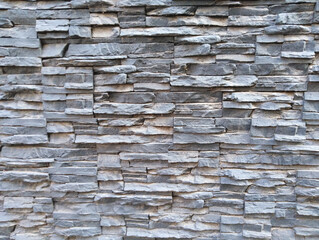 the texture of a stone composed of small multi-colored tiles.