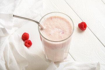 Crimson protein cocktail on a white table.