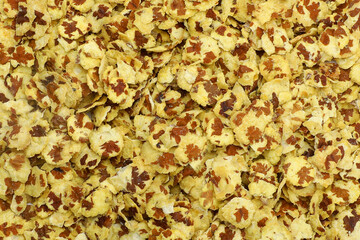 Indian snacks chana chor/jor garam as background texture.