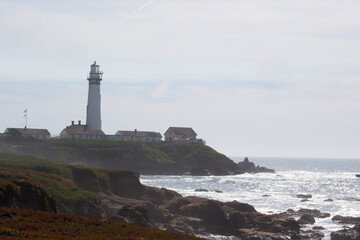 Fototapeta na wymiar Lighthouse on a rocky shore
