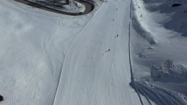aerial top view of alpine skiing downhill piste