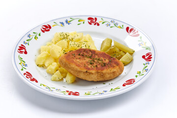 cutlet with mashed potato on white plate