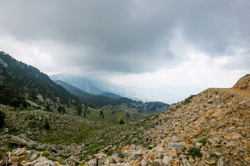 Fototapeta na wymiar Panoramic view from the peak of Tahtali, also known as Lycian Olympus, a mountain near Kemer, a seaside resort on the Turkish Riviera in Antalya Province, Turkey