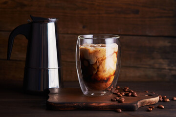 Ice coffee in a double-walled glass