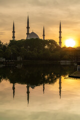 Majestic sunrise view of Sultan Salahuddin Abdul Aziz Shah mosque, known as Shah Alam mosque.