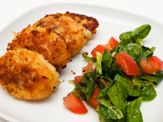 Pasteis de bacalhau - portuguese cod fritters with salad