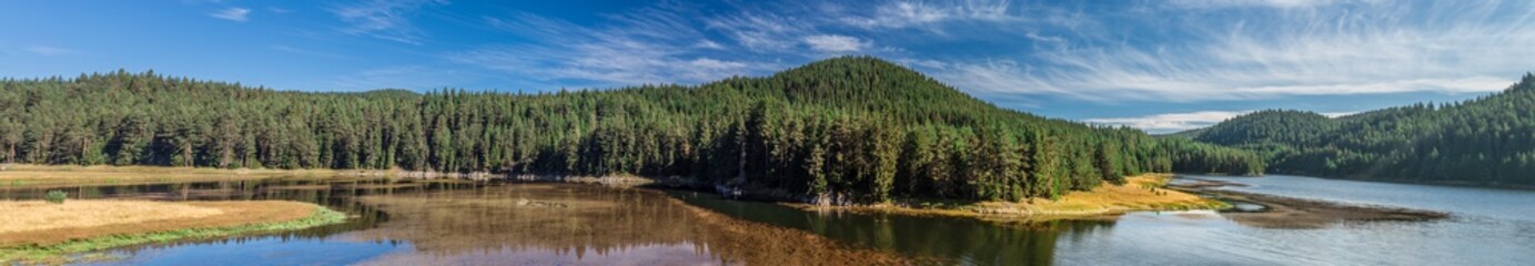 Fototapeta na wymiar Landscape of Shiroka Polyana lake in Rhodope Mountains at autumn time