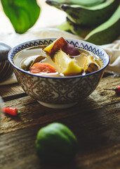 Latin American vegetable soup with ingredients carrot, chayote, sweet potato, green banana pepper