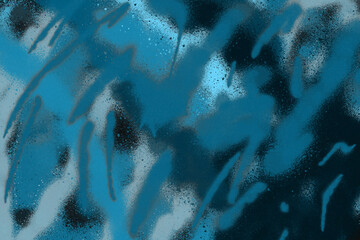 Blue spray paint ink texture. Graffiti painting on the wall. Street art and vandalism. Digitally airbrushed paper background.