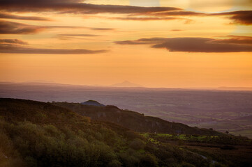 Carrowkeel, Co Sligo view at sunset at passage tomb and mountain Croagh Patrick