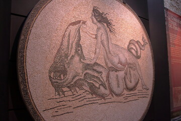 Romanesque mosaic: nereid on the sea monster