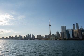 Fototapeta premium Toronto City Skyline from the ferry on a sunny day in Ontario Canada