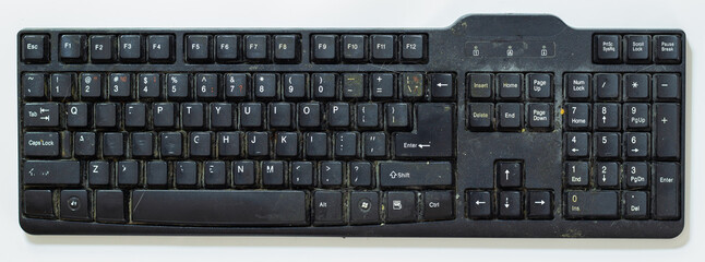 Black computer keyboard very dirty. Dirty keyboard