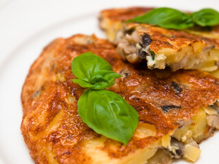Spanish tortilla with mushrooms and basil