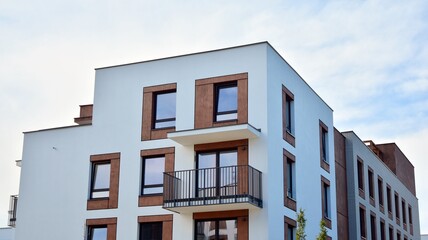 Fototapeta premium Futuristic square architecture of apartment building for real estate with big windows.
