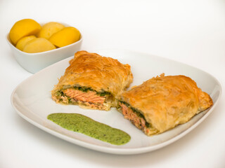 Salmon in puff pastry with potatoes