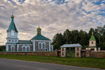 Fototapeta na wymiar Beautiful Peter and Paul church. Kosuta village, Minsk region, Belarus.