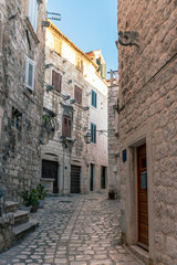 Narrow cobbled street in the town of Hvar, Adriatic coast, Croatia.