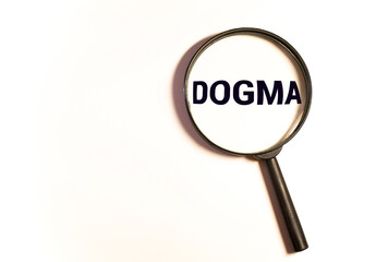 text: DOGMA on magnifying glass.