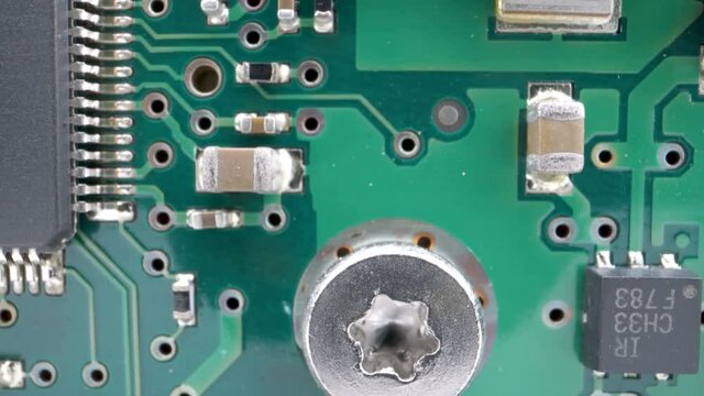 The look of the tiny holes on the green circuit board