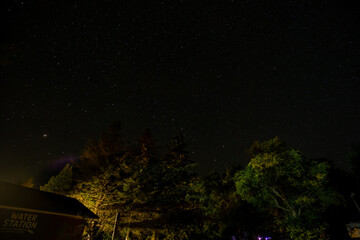 Stars at night otter lake in summer Michigan upper peninsular