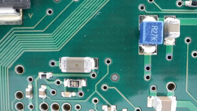 A closer look of the small parts of the green circuit board