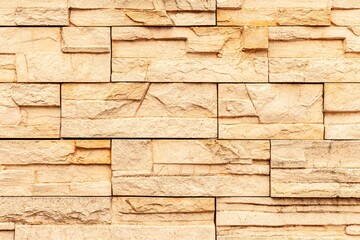 Brown pattern of black stone cladding wall tile texture and seamless background