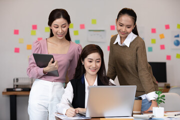 Group of young business Startup coworkers working Brainstorming together to get ideas and marketing plan at office,Business Startup Diversity Concept