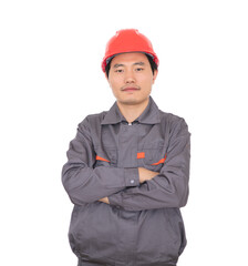 Male worker wearing red hard hat standing in front of white background with arms folded