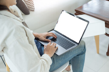 computer mockup blank screen.hand woman work using laptop with white background for advertising,contact business search information on desk at coffee shop.marketing and creative design