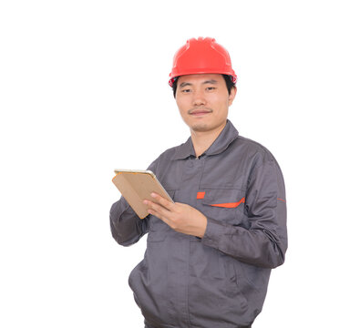 A Construction Worker With A Red Hard Hat Is Holding An IPad In Hand While Standing In Front Of A White Background And Looking At The Camera