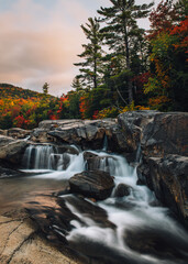 Scenic View Waterfall in North Conway, New Hampshire With Fall Foliage