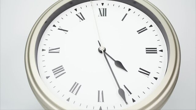 Four o'clock classic Face With Roman Numerals, Time lapse 60 minutes.