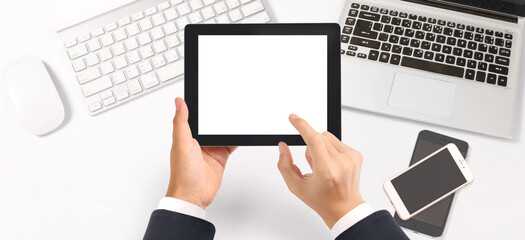 Hands holding tablet touch screen