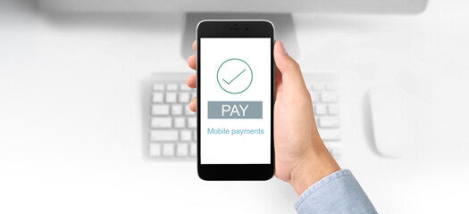 Hand holding smartphone device  touching screen