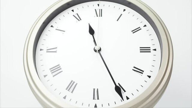Eleven o'clock classic Face With Roman Numerals, Time lapse 60 minutes.