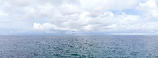 Fototapeta na wymiar Panorama view Sea Waves blue sky on background.