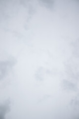 The white-gray surface has a slight abstract pattern.