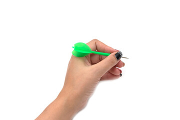 Hands with darts at the target center on white background