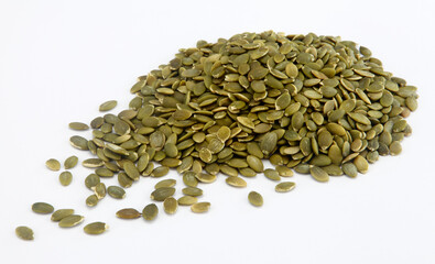 pumpkin seeds on white background.