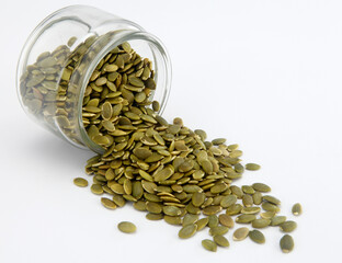 pumpkin seeds on white background.